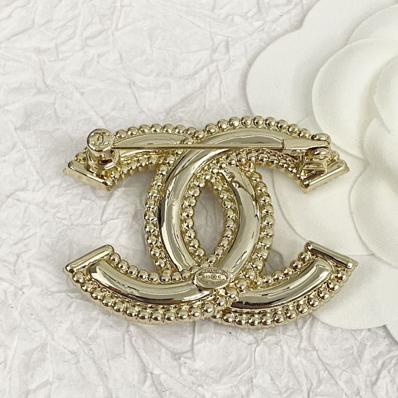 Ch**el brooches